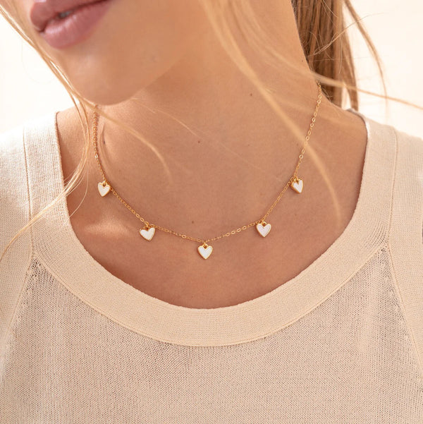 Cadena Multi Corazones Blanco Hueso + aretes